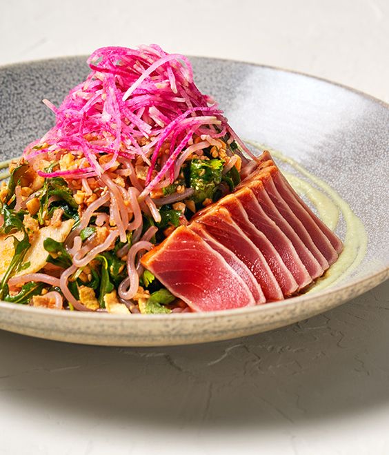 <who>Photo credit: Earls</who>The sesame citrus noodle bowl with ahi tuna is new on the menu.