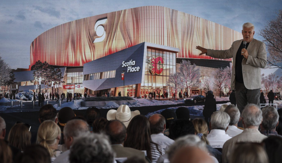 <who> Photo credit: Canadian Press </who> Bill Johnson, design principal with HOK, describes the design of the new Calgary Flames arena to dignitaries at a ceremony in Calgary, Alta., Monday, July 22, 2024.