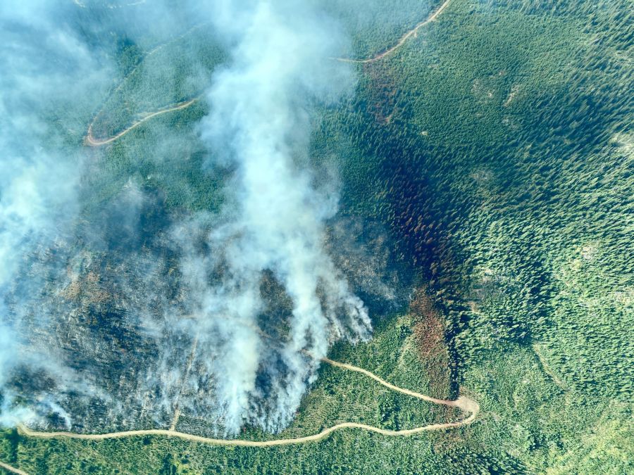 <who> Photo Credit: BCWS</who> Aerial view of a fire burning in the Cariboo Fire Centre.