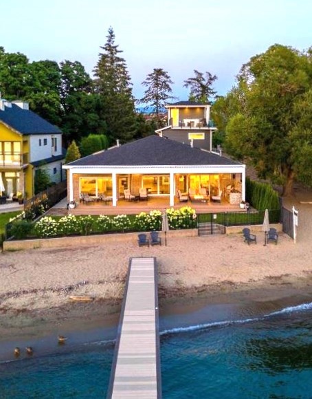 <who>Photo credit: Realtor.ca</who>The Lakeshore Road house in Kelowna has its own 64 feet of beach.