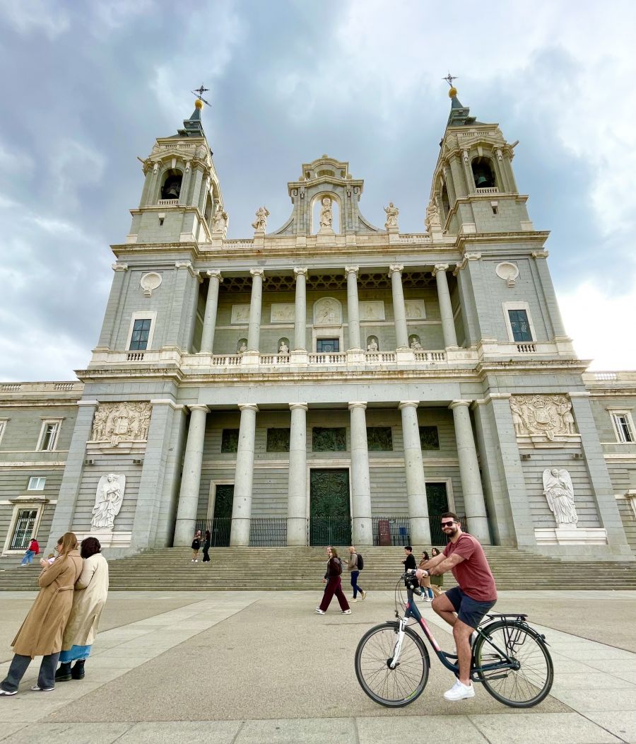 <who>Photo credits: Steve MacNaull/NowMedia Group</who>The Tim Bikes 'Madrid Highlights with Tapas' cycle tour, above, whips by Madrid Cathedral. Below, the ornate, 3,418-room Royal Palace.