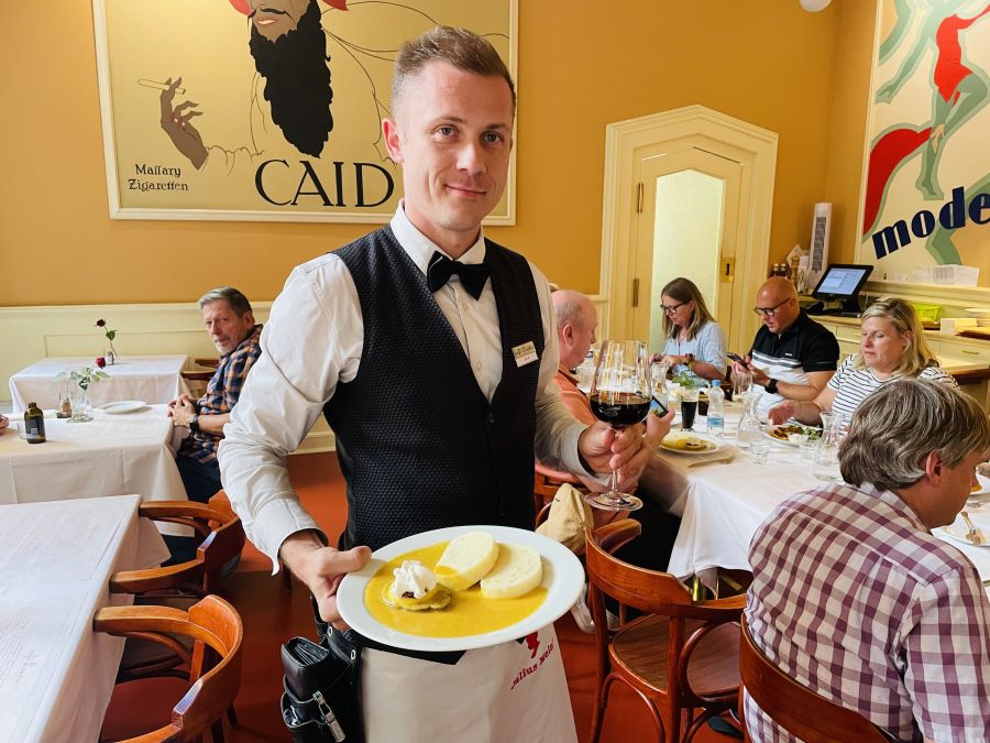 </who>Waiter Jan Pacak brings out the ‘svickova’ and Czech merlot at Cafe Louvre.