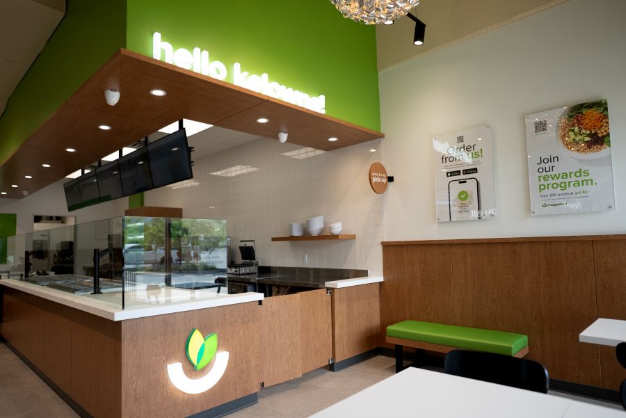 <who>Photo credit: Chopped Leaf</who>The new interiors feature a lime green, black and natural wood colour scheme and lower counters for better customer and staff interaction.