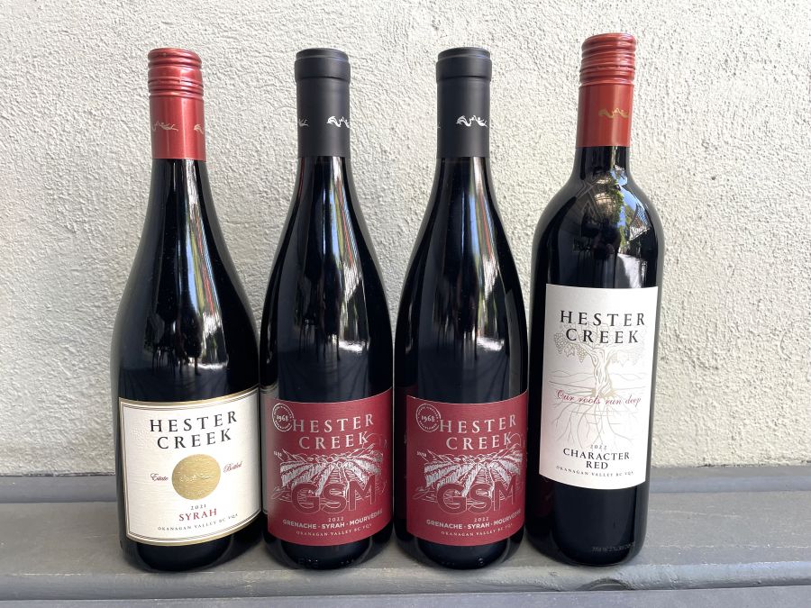 <who>Photo credit: Steve MacNaull/NowMedia Group</who>New release reds from Hester Creek, from left, 2021 Syrah ($30), 2022 GSM (Grenache-Syrah-Mourvedre) ($35) and 2022 Character Red ($23).