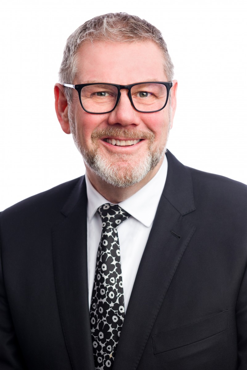 <who>Photo credit: Kelowna International Airport</who>Geoff Ritchie is the commercial and air service director at Kelowna International Airport.