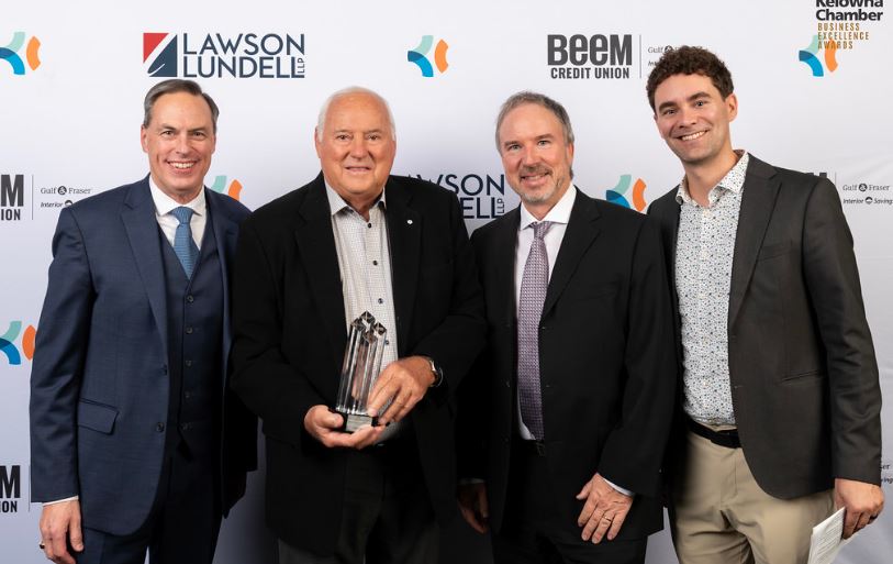 <who>Photo credit: Kelowna Chamber of Commerce</who>KF Aerospace won ‘large business of the year’ at the 2024 Kelowna Business Excellence Awards. Company founder, Barry Lapointe, second from left, has also been inducted into Canada’s Aviation Hall of Fame, the Order of Canada and the Order of British Columbia for his contributions to the industry.