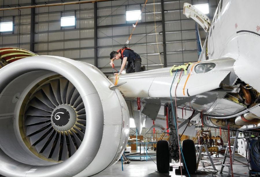 <who>Photo credit: KF Aerospace</who>KF Aerospace does aircraft maintenance and retrofitting at its hangars adjacent to Kelowna International Airport.