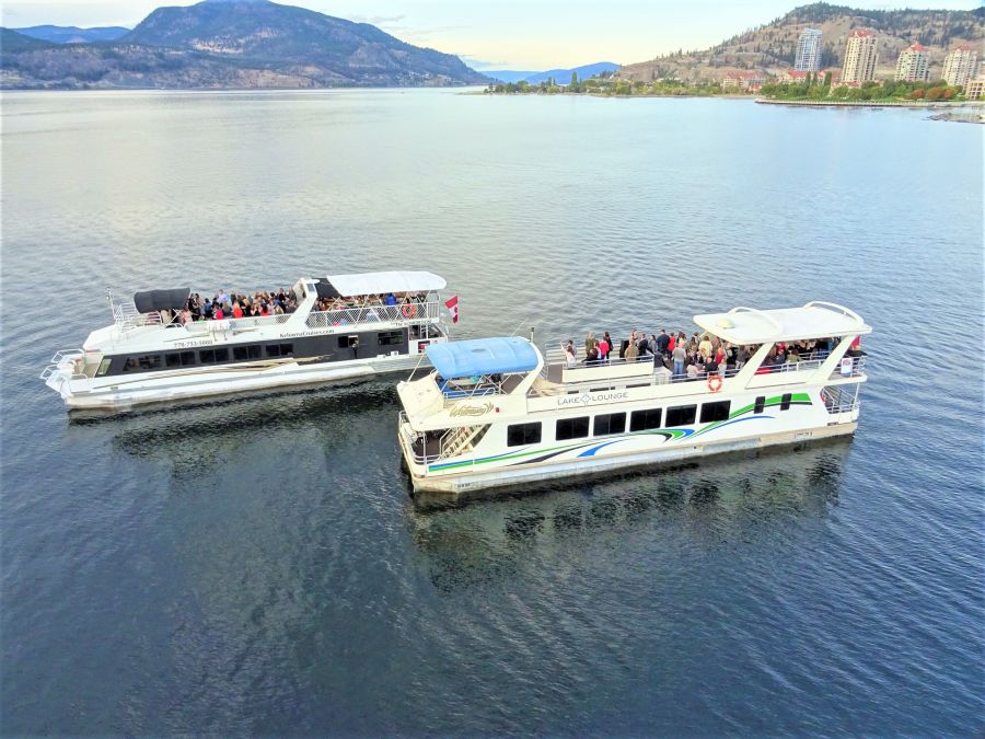 <who>Photo credit: Kelowna Cruises</who>Houseboat cruises are also popular in Kelowna.