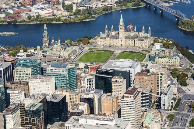</who>Ottawa with the Parliament Buildings in the background.