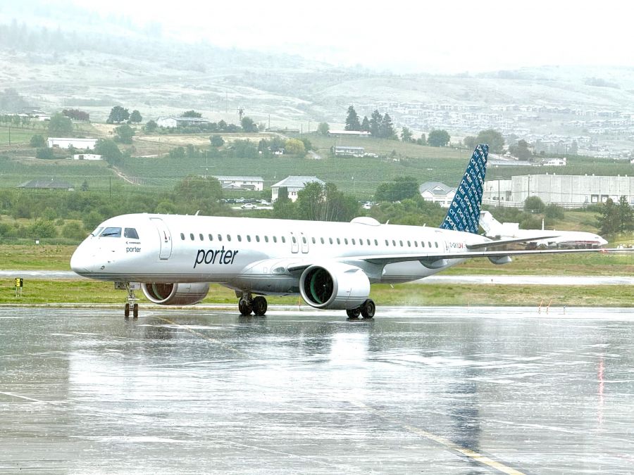 </who>The first flight from Ottawa landed in Kelowna in rainy conditions Wednesday morning.