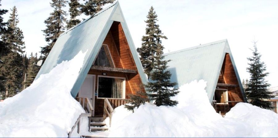 <who>Photo credit: Colliers</who>A-frame cabins.
