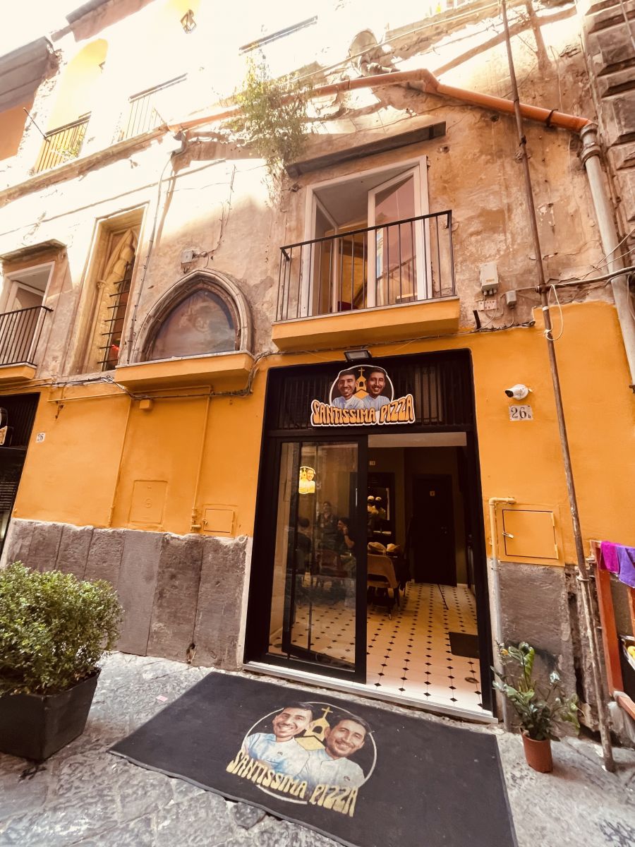<who>Photo credits: Steve MacNaull/NowMedia Group</who>Santissima Pizza is located in the former 17th century Santa Maria Porta Cieli church in Old Town.