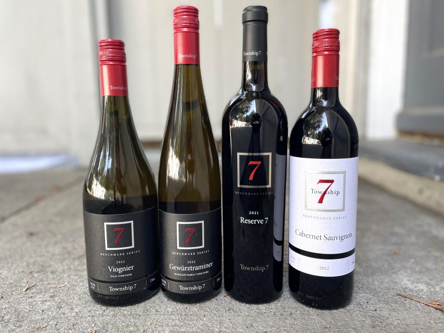 <who>Photo credit: Steve MacNaull/NowMedia Group</who>New spring releases from Township 7, from left, Benchmark Series 2023 Viognier ($31), Benchmark Series 2022 Gewurztraminer ($30), Benchmark Series 2021 Reserve 7 ($45) and Provenance Series 2022 Cabernet Sauvignon ($34).