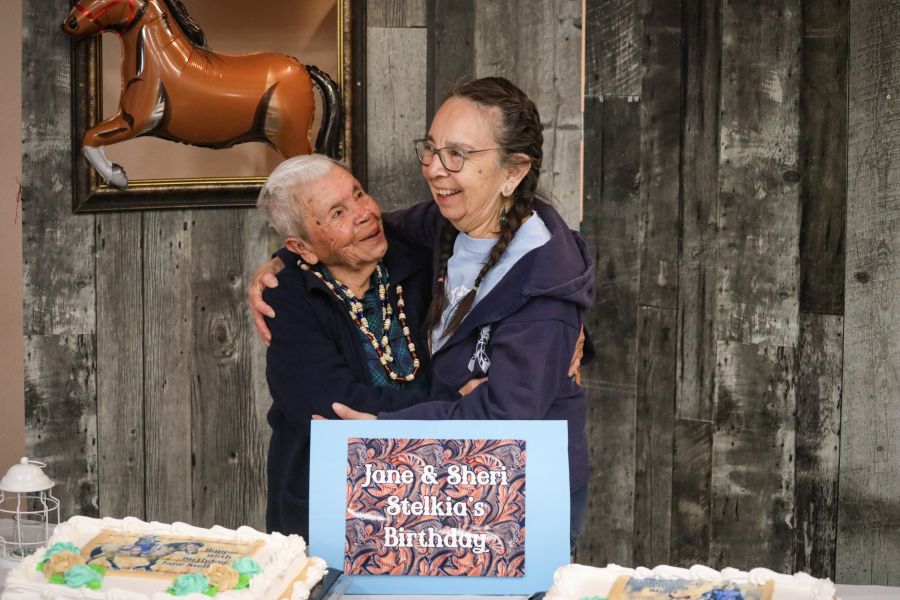 <who> Photo Credit: Aaron Hemens</who> Jane and Sheri Stelkia celebrate their birthdays together at Nk’mip Campground’s Clubhouse in sw̓iw̓s (Osoyoos) on April 11. 