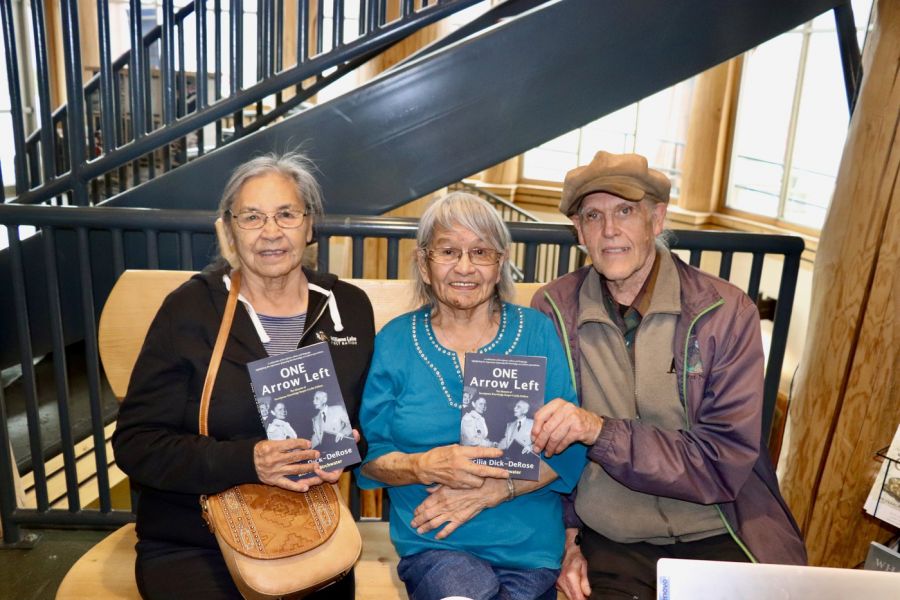 <who> Photo Credit: Dionne Phillips</who> Authors Cecilia DeRose (centre) and Sage Birchwater (right) at their book signing on May 3, accompanied by Secwépemc Elder Jean William.
