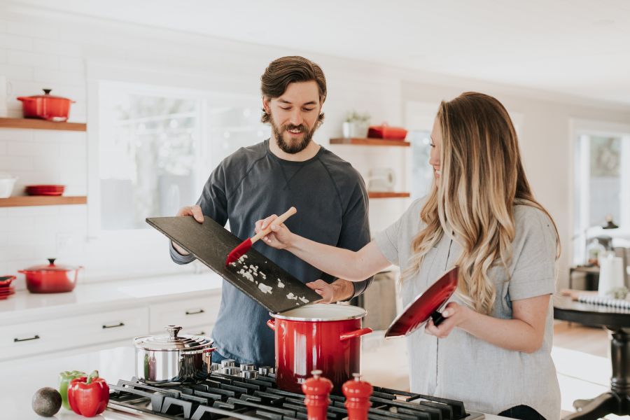 <who>Photo credit: Becca Tapert on Unsplash</who>Does this couple look like they enjoy paying a hefty mortgage? Seems so.