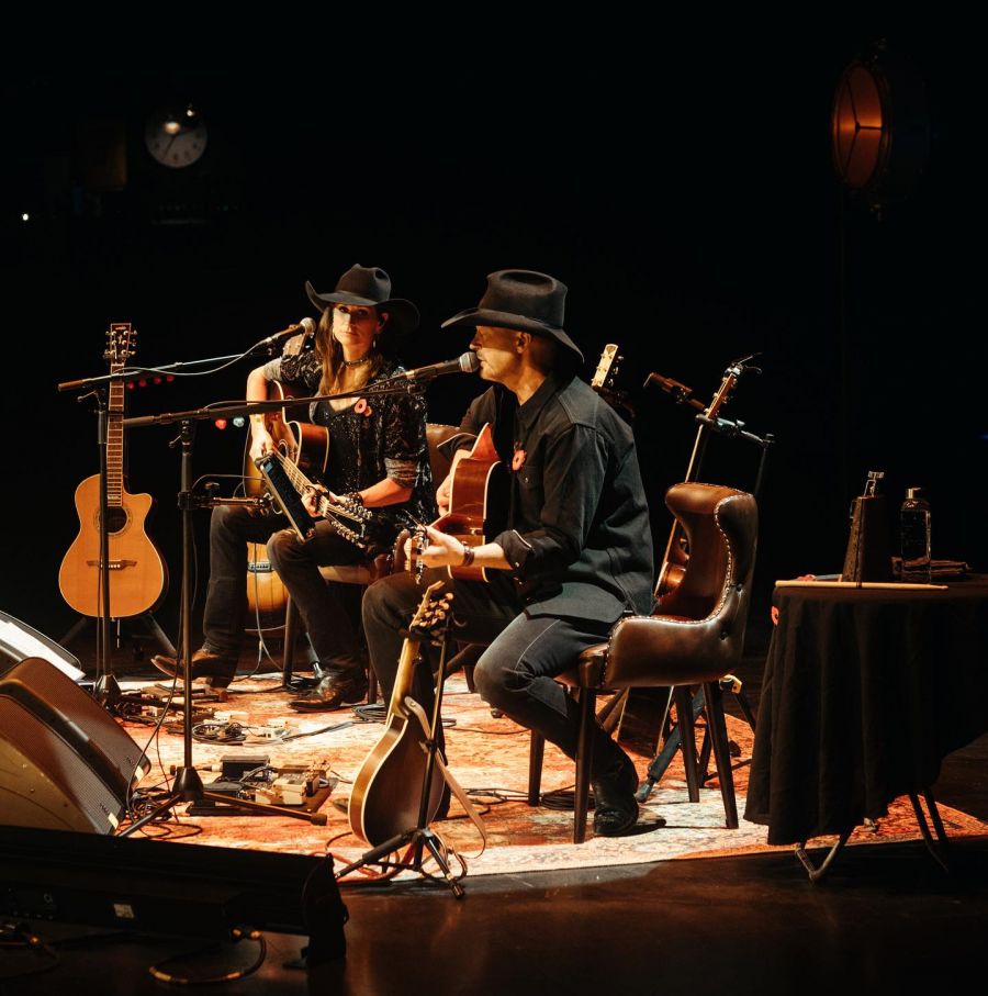 <who>Photo Credit: Paul Brandt/Facebook</who>Clark and Brandt on tour in 2023.