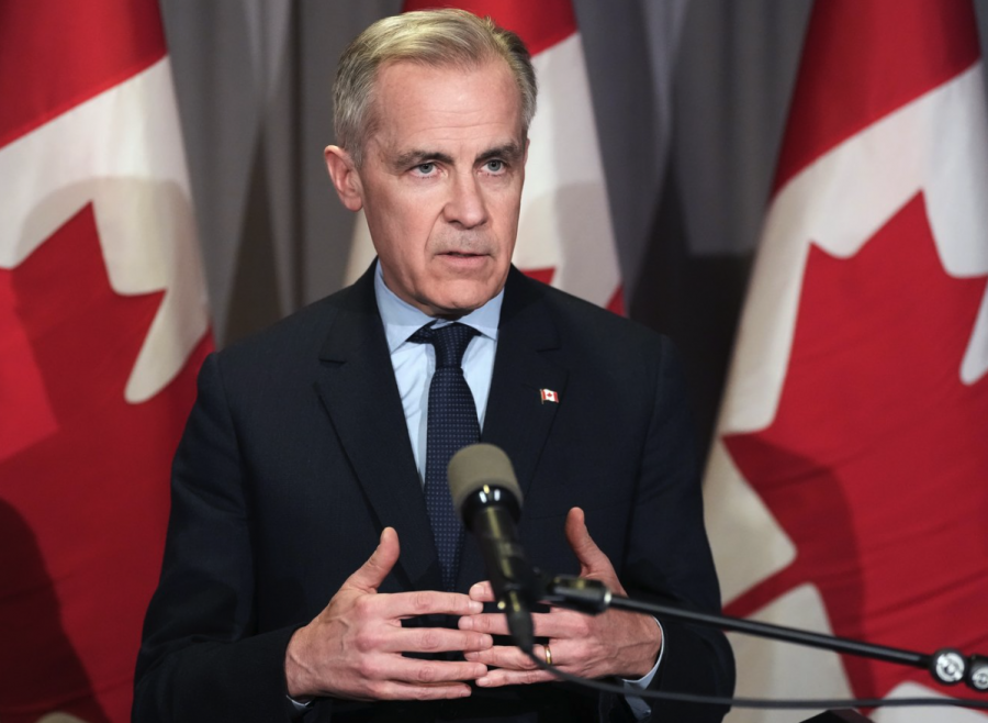 <who> Photo credit: Canadian Press </who> Mark Carney.