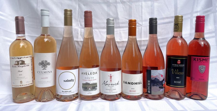 </who>Rose galore. From left, Santa Margherita 2022 ($20), Culmina Saignee 2023 ($26), Saintly The Good 2024 ($20), Aveleda Fonte Vinho Verde 2022 ($18), Maverick Invisible Line 2024 ($28), Sandhill 2023 ($22), Roche 2024 Artist Series ($29), Noble Ridge Vilicus 2024 ($21), Kismet Kamal 2023 ($25).
