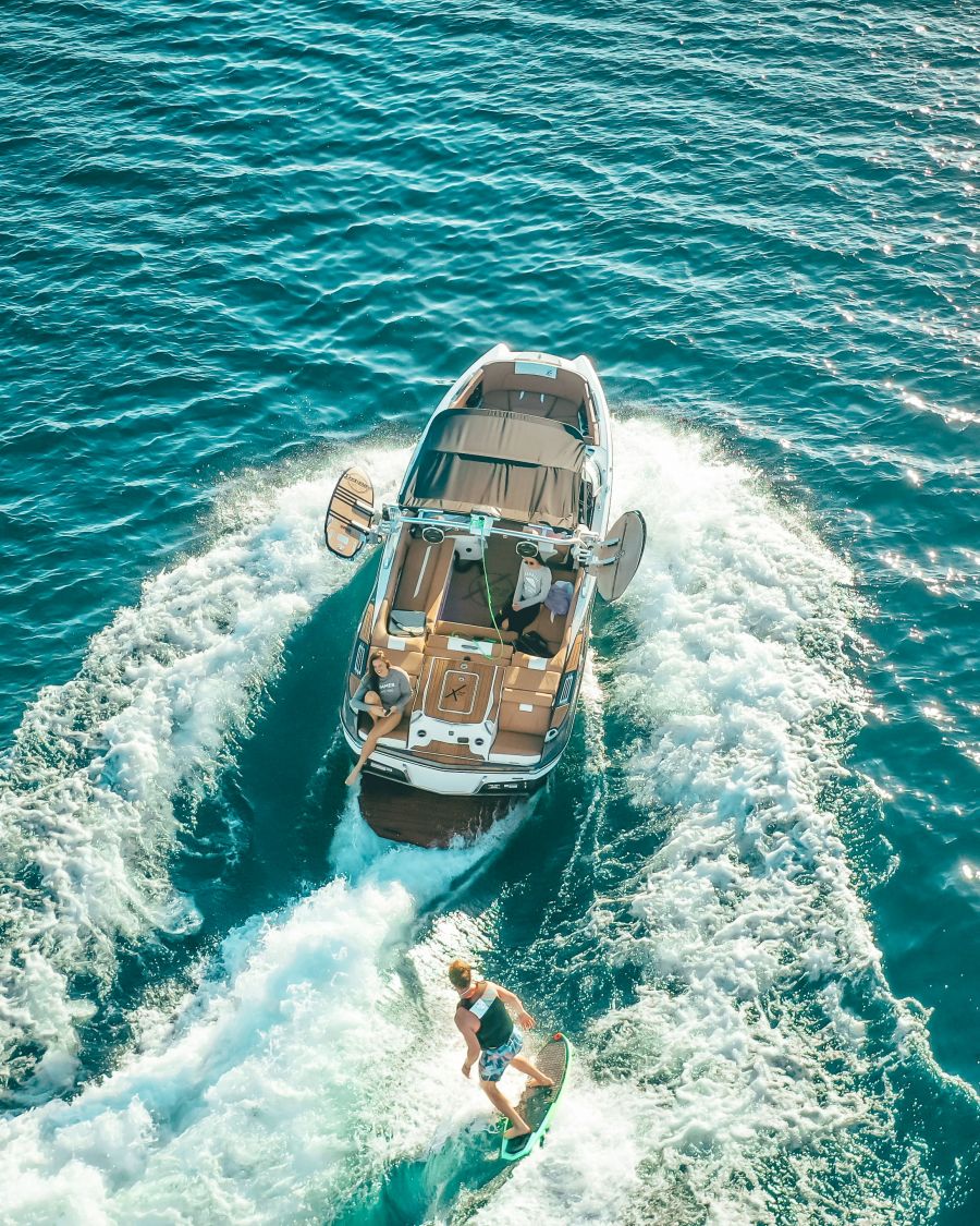 <who>Photo credits: Drew Dau on Unsplash (above) and GetMyBoat (below)</who>A wakeboat, above, is the most popular rental type in Kelowna, while a yacht, below, is the most popular in Vancouver, Toronto and Montreal.