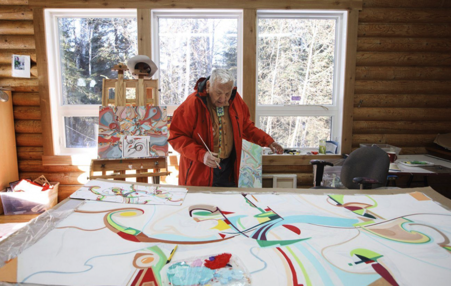 <who> Photo credit: Canadian Press </who> Alex Janvier works at his studio on the Cold Lake First Nations, Alta., on Wednesday, Feb. 8, 2017.