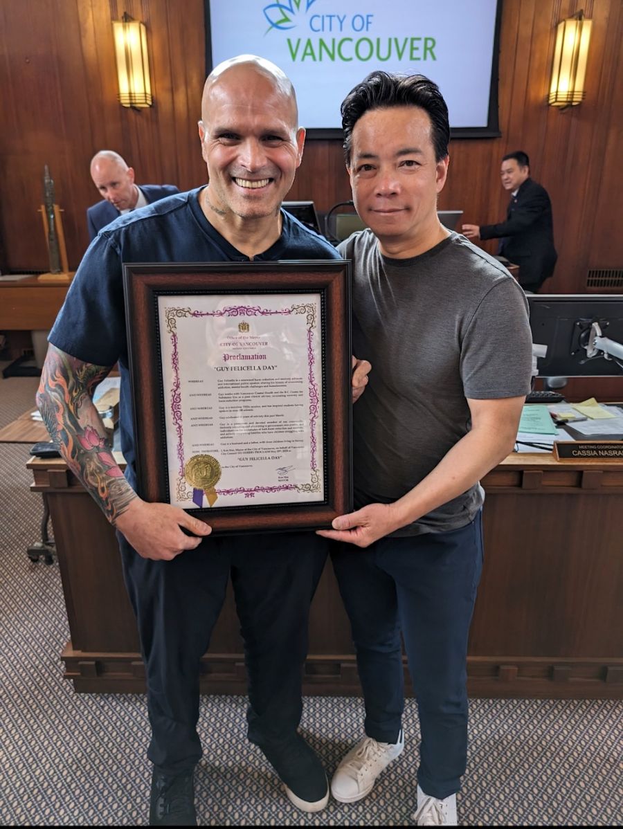 <who>Photo Credit: Local Journalism Initiative</who>Guy Felicella with Mayor Ken Sim in 2024, when Sim declared May 29 ‘Guy Felicella Day’ in recognition of Felicella’s harm reduction and recovery advocacy.