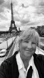 </who>Sherry Hansen-Smith in Paris this spring, above, and in her flight attendant uniform in 1988, below.