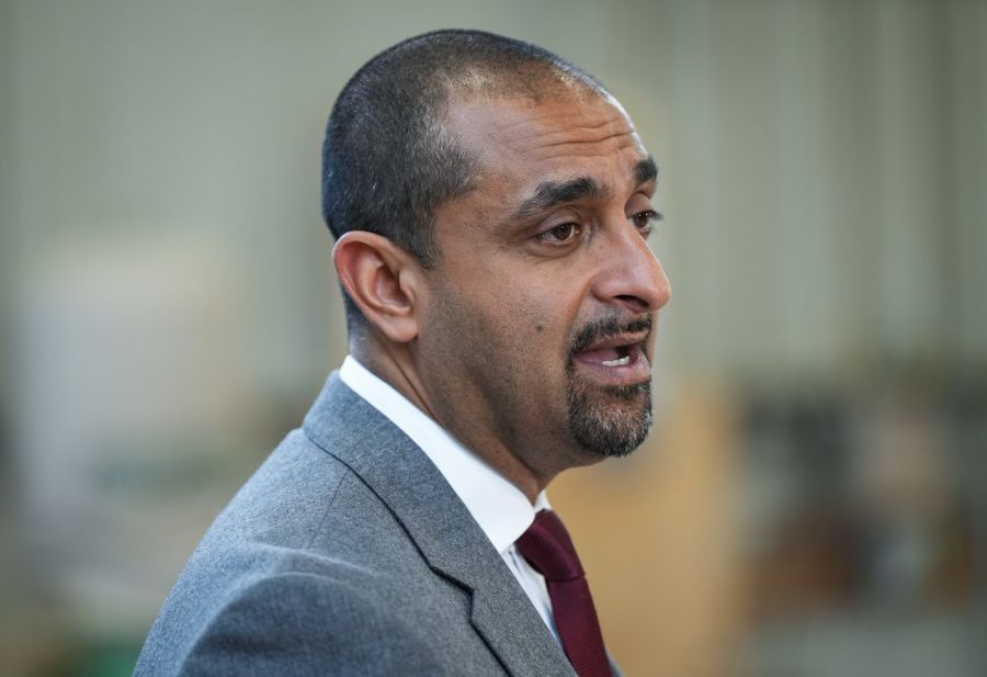 <who>Photo Credit: Canadian Press</who>Housing Minister Ravi Kahlon