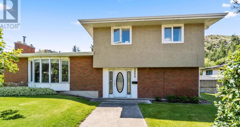 <who>Photo credit: Realtor.ca</who>his four-bedroom, two-bathroom house on Dallas Drive is listed for sale for $659,900, which is a little less than the $664,300 benchmark selling price of a typical single-family home in Kamloops in August.