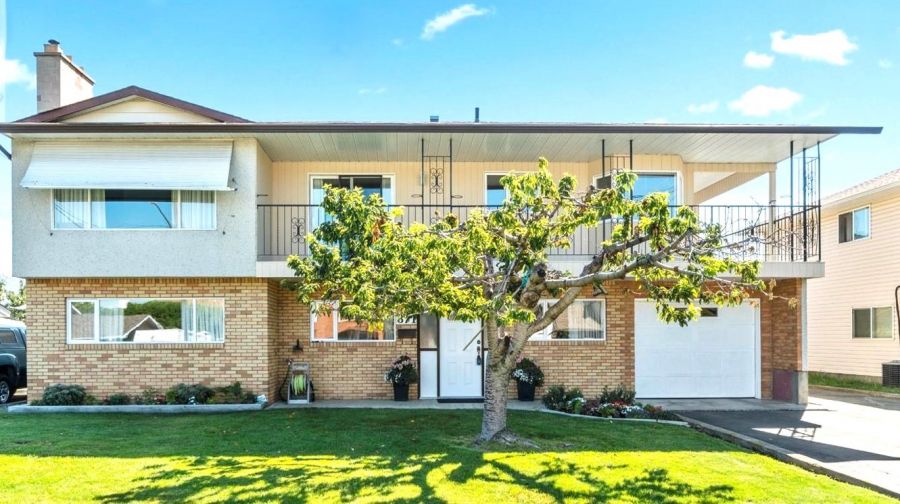 <who>Photo credit: Realtor.ca</who>This 2,448-square-foot, five-bedroom, two-bathroom house on Ollek Street is listed for sale for $679,900, which is just a little more than the $658,400 benchmark selling price of a typical single-family home in Kamloops in July.