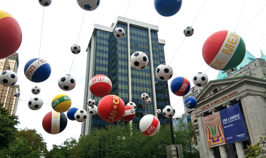 <who> Photo credit: Photo by Mike McNeeley </who> Many residents, tourists and business owners are looking forward to the opportunities that come with FIFA. But critics say hosting such a high profile sporting event comes at too high a cost.