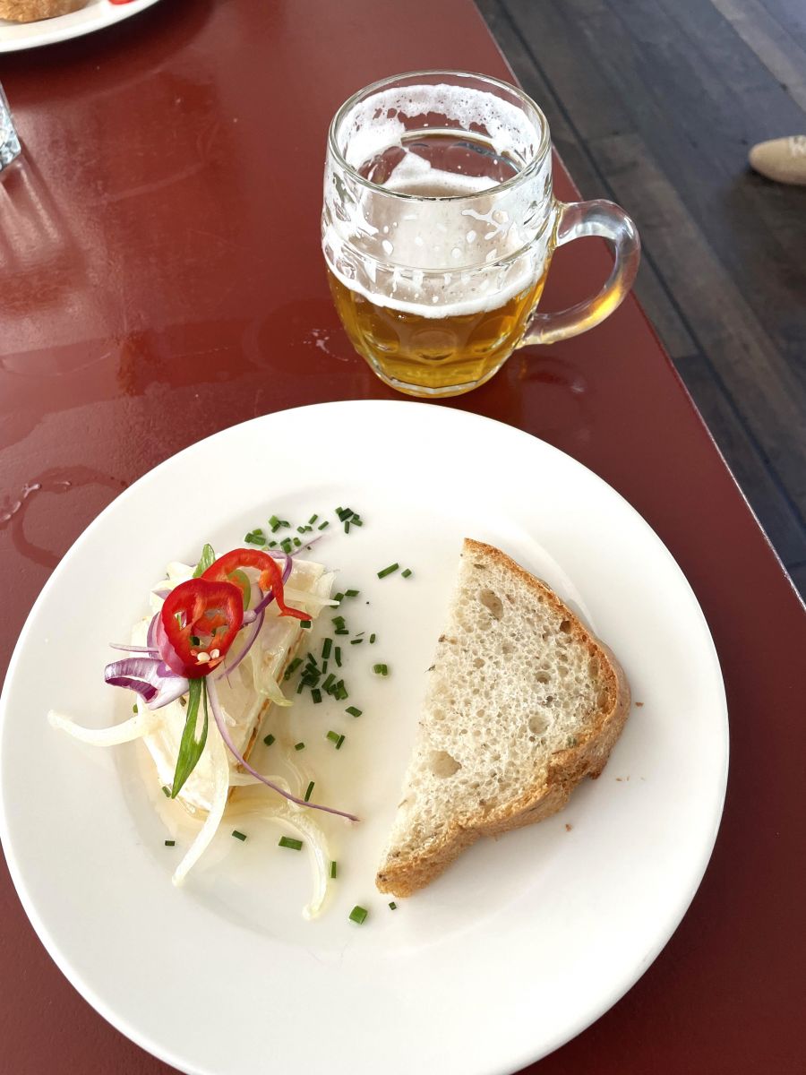 </who>The marinated cheese and light beer at floating brewery Lod Pivovar.