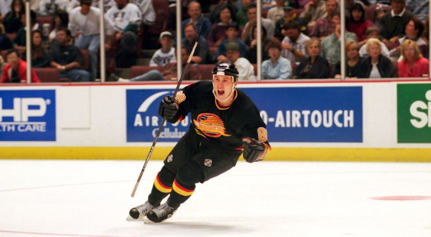 <who>Photo Credit: Vancouver Canucks on X</who>Alexander Mogilny's best season in Vancouver was his first, as he scored 55 goals and 107 points in 1995-96.