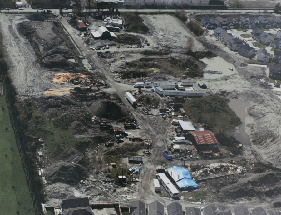 <who> Photo credit: Canadian Press </who> An aerial view of the Pickton farm in Port Coquitlam, taken by police during their investigation in 2002. 