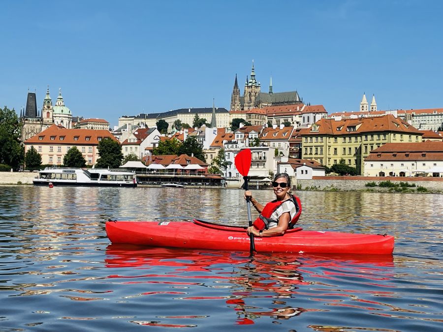 </who>The Prague on Kayak tour glides by Prague Castle in the background.