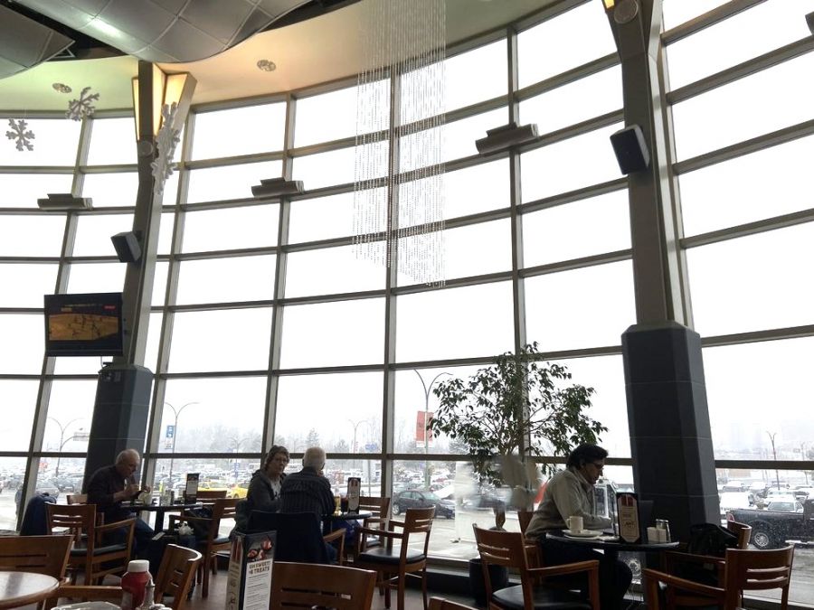 <who>Photo credit: Yelp</who>The new Ellison Field Taphouse at Kelowna airport will be in the former pre-security White Spot space that's open to the main terminal concourse and features massive windows to the front of the terminal.