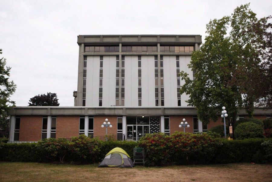 <who>Photo Credit: Canadian Press</who>A tent stands in front of the Victoria Courthouse.
