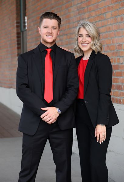<who>Photo credit: TJ & Steph Real Estate Group</who>TJ Dumonceaux and Stephanie Ostash of the TJ & Steph Real Estate Group.