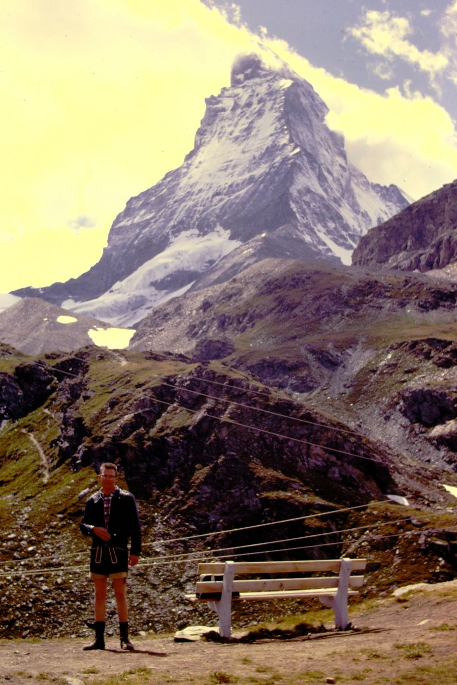<who>Photo Credit: Robert Murray</who>Robert Murray on his travels during his youth. Here he is pictured standing in front of the iconic Matterhorn.