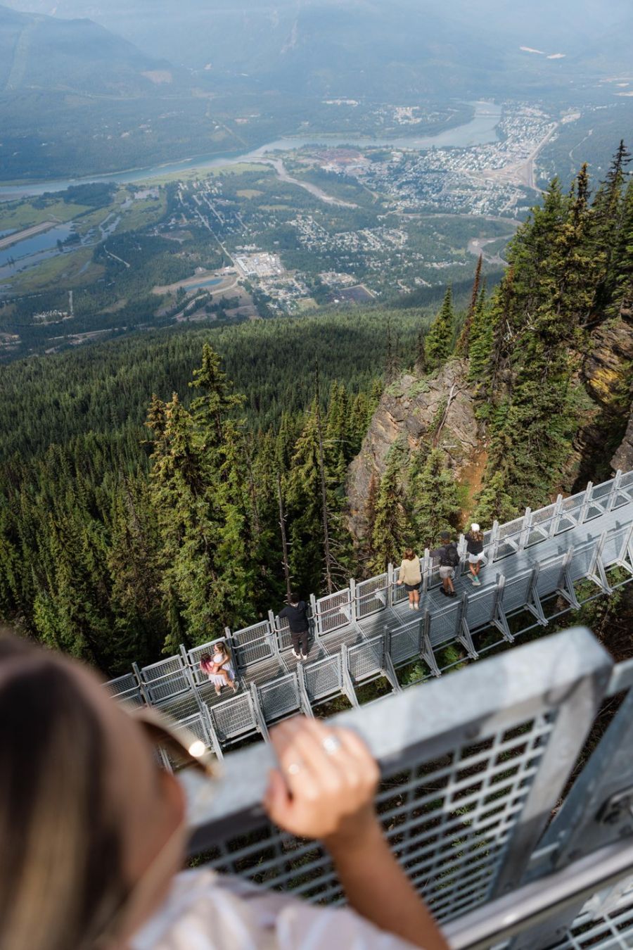 </who>Looking down from the viewing platform to the suspension bridge.