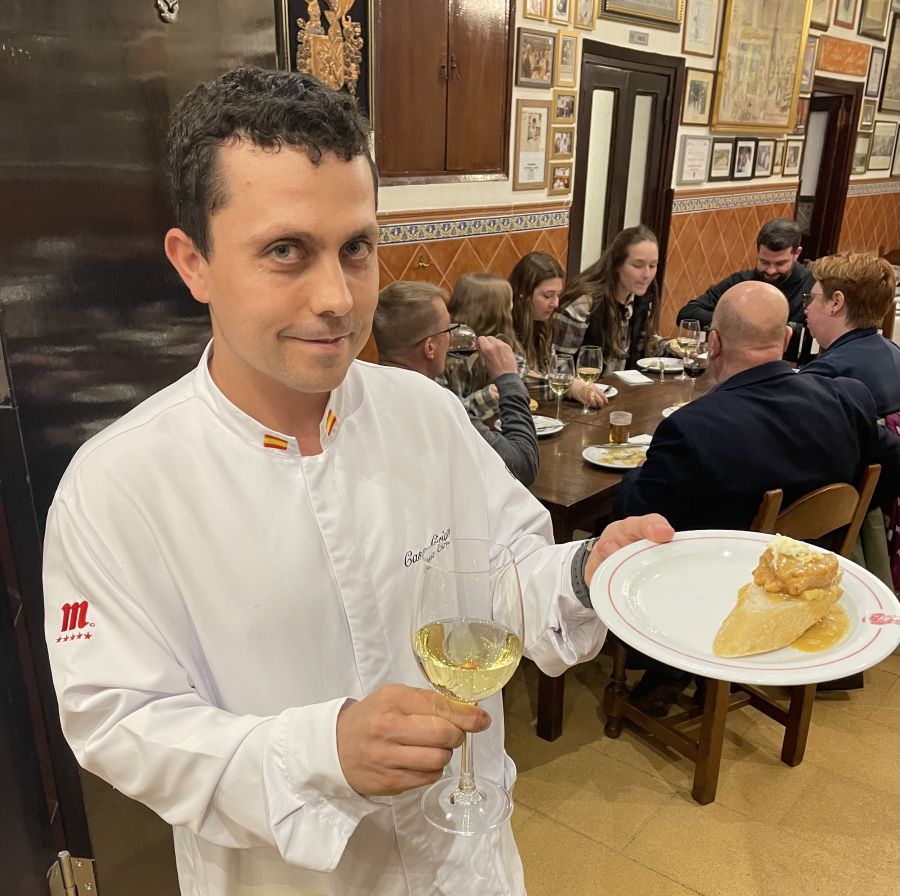 <who>Photo credit: Steve MacNaull/NowMedia Group</who>Waiter Edgar brought us hen in saffron and almond sauce with glasses of Verdejo white wine.