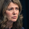 Danielle Smith heckled by raucous crowd during hours-long town hall