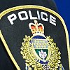 Police officer facing charges, accused of taking photo of woman's dead body